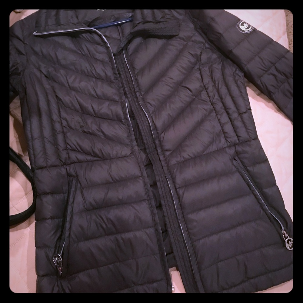 Micheal Kors light weight jacket. Packable